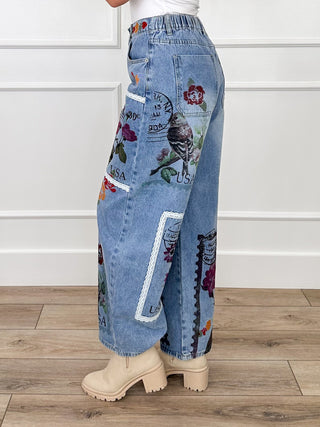High-rise barrel-leg jeans with side patch panels, medium wash denim
