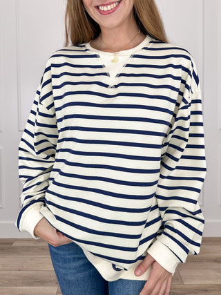 Ribbed long-sleeve henley striped top in cream and navy with buttoned neckline