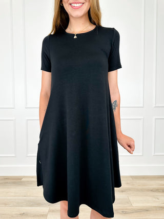 Lightweight black crew-neck short-sleeve swing dress with side pockets