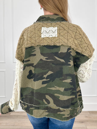 Women’s camo long-sleeve jacket with lace sleeve panels and quilted back panel detail