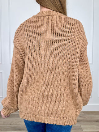 Tan knit long-sleeve cardigan, back view with textured stitch pattern