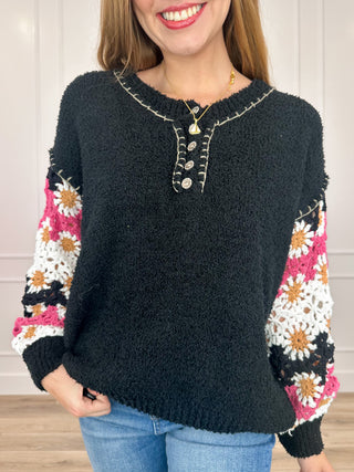 Knit long-sleeve sweater top, dark with button placket and floral patterned sleeves