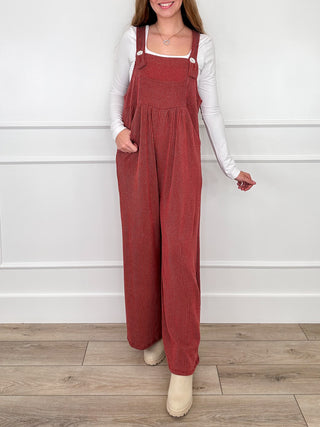 Wine red ribbed overalls with adjustable straps, square neckline bib, wide legs