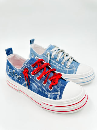 Denim sparkle sneakers with red laces, white rubber sole and blue trim
