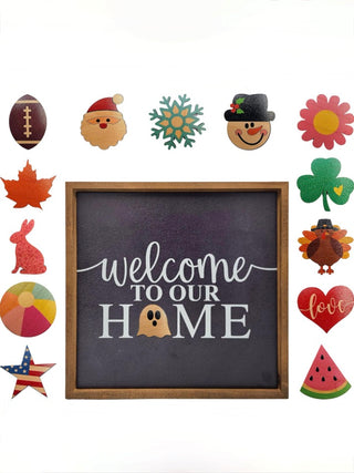 Colorful magnetic welcome sign with chalk-style text and holiday character icons