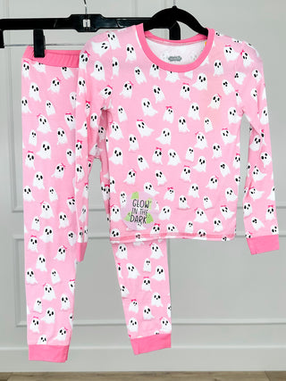 Pink kids pajama set with long sleeves, ghost print, glow-in-the-dark text