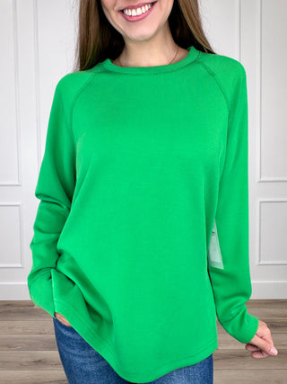 Kelly green ribbed long-sleeve top with raglan sleeves and crew neck