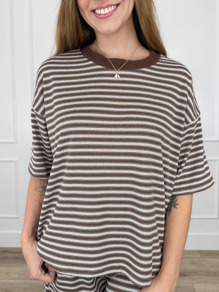 Brown and white striped short-sleeve top with crew neckline and relaxed fit