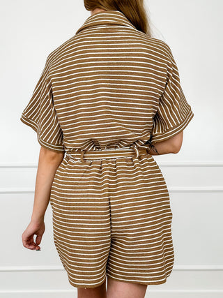 Striped romper from back view with drawstring waist and gathered short sleeves