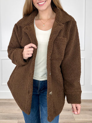 Brown sherpa long-sleeve jacket with button front and open collar
