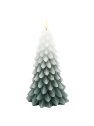 Tall tree-shaped LED candle with layered white-to-dark green scales and a glowing tip.