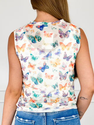 Back of sheer mesh tank top with colorful butterfly print and sleeveless cut