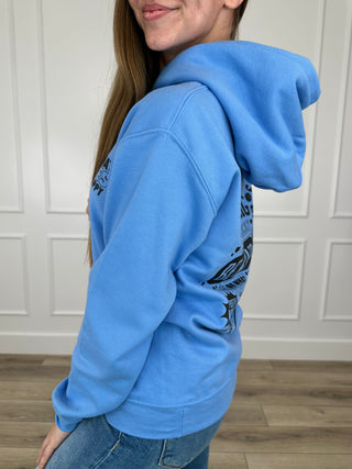 Blue long-sleeve graphic hoodie with hood and front pocket, side view