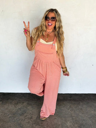 Ribbed coral orange overalls with adjustable straps and bib pocket