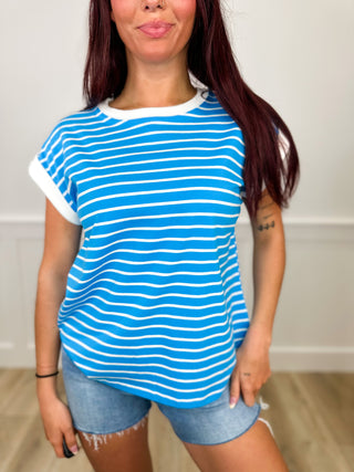 Blue-and-white striped cotton blend short sleeve top with crew neckline.