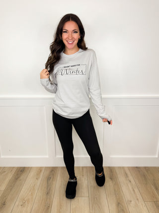 Light gray sweatshirt with Winter print and black slim pants