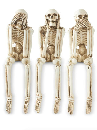 Resin skeleton decor set of three white standing figures with hand details