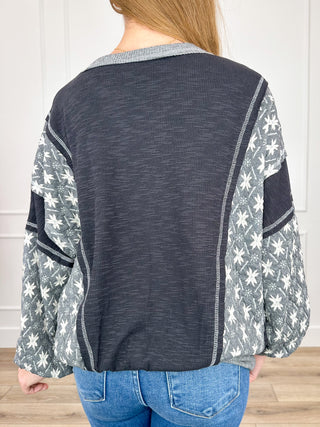 Cotton-blend long-sleeve top, back view dark gray body with star print sleeves