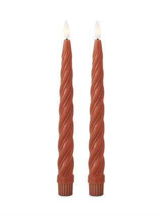 Twisted LED candle set, two rust orange spiral candles with glowing tips