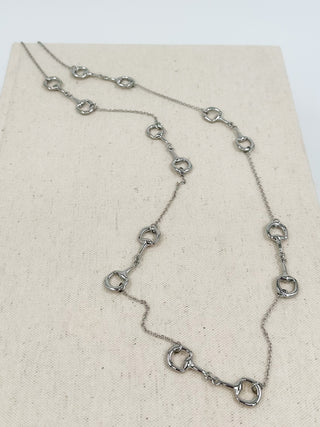 Silver-tone chain necklace with linked oval stations and lobster clasp