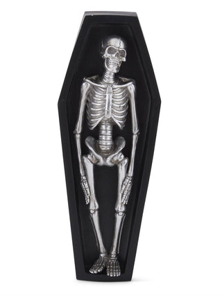 Black resin coffin decor with silver skeleton resting inside