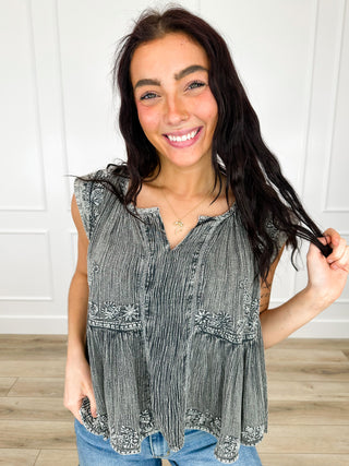 Lightweight tank top in dark charcoal gray with embroidered chest panels and tiered hem
