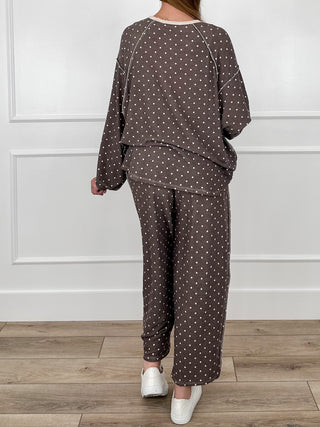 Brown dotted knit lounge set, back view of long-sleeve top and high-rise pants