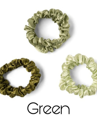 Ruffled satin scrunchies in green shades, three circular hair ties