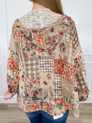 Women's hooded button-up top, back view with red floral patchwork on brown