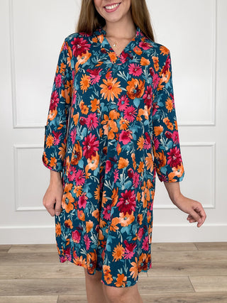Floral teal V-neck shift dress with long, billowy sleeves