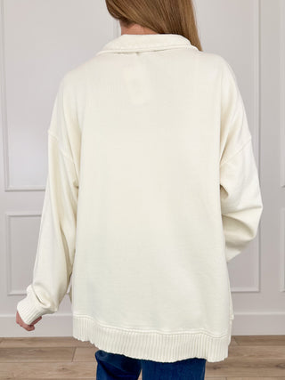 Cream cotton pullover sweatshirt back view with hood and ribbed hem