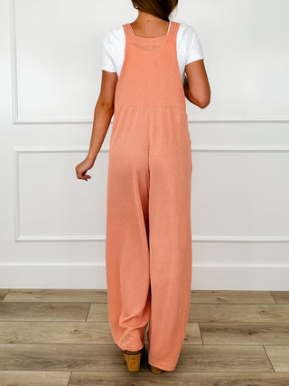 Coral ribbed overalls with wide legs and adjustable shoulder straps