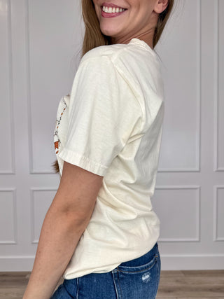 Cream short-sleeve cotton tee, side graphic on sleeve and chest