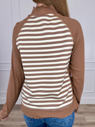 Brown ribbed long sleeve mock neck top with striped back panel