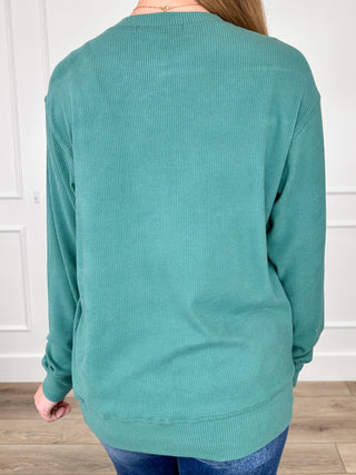 Green long-sleeve crew-neck top, back view with ribbed hem and cuffs
