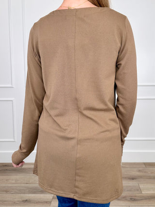 Brown long-sleeve cardigan back view, center seam and button detail