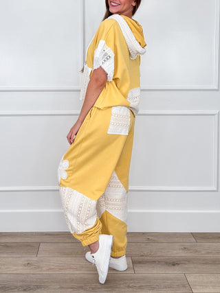 Yellow wide-leg set with white crochet trim, hooded short-sleeve top and matching pants
