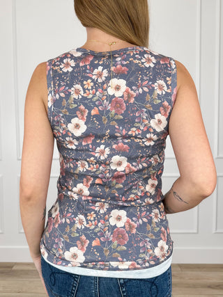 Back of floral sleeveless tank top in navy with pink and cream flower print, scoop