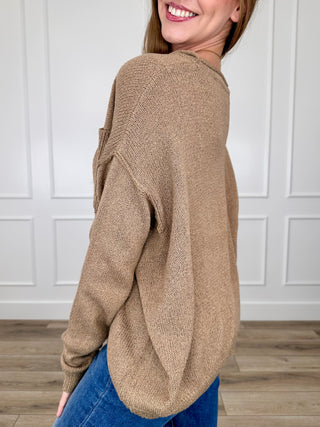Tan knit long-sleeve sweater relaxed side view with ribbed crew collar