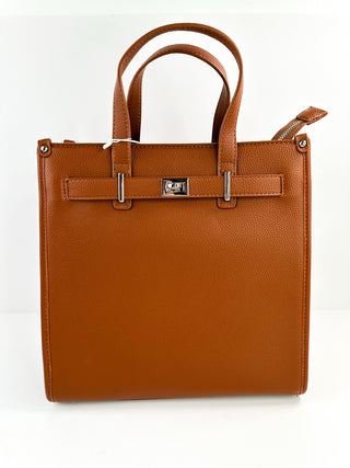 Brown faux leather tote bag with top handles and front buckle detail