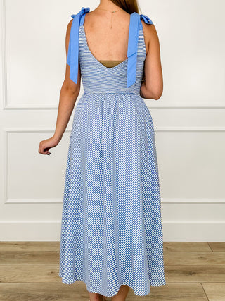 Lightweight blue striped A-line dress with bow straps and square back neckline