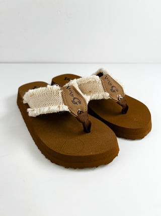 Natural canvas thong sandals with frayed strap trim and dark brown footbed