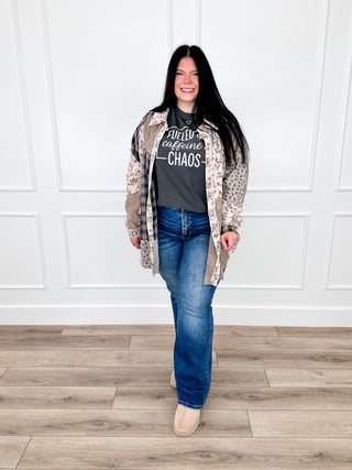 Dark wash straight-leg jeans with distressed legs and frayed knee areas
