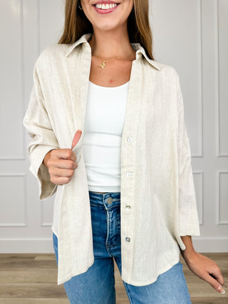 Sand knit 3/4 sleeve button-up top with collar, front buttons, and relaxed fit