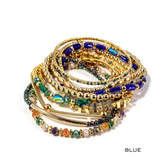 Blue beaded bracelet stack with gold-tone beads, rhinestones, and layered wrap bands