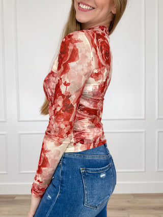 Sheer mesh long-sleeve top with red floral print on cream, high neck, fitted