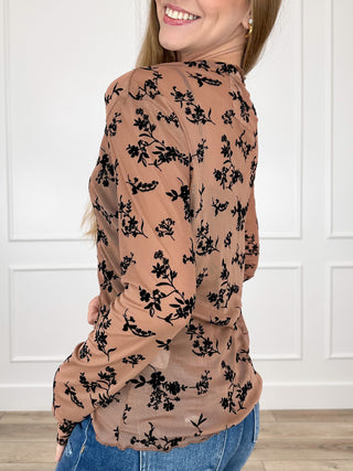 Tan sheer mesh long-sleeve top with black floral print, crew neck