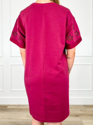 Wine red cotton-blend shift dress, back view, with embroidered eyelet sleeve details