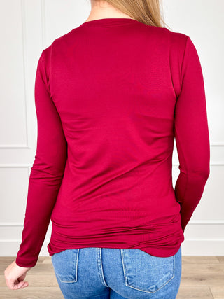 Wine red long-sleeve crewneck fitted top, back view