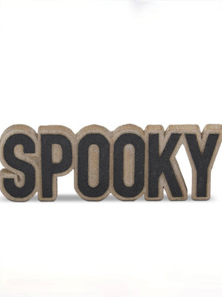 Wooden shelf sitter with carved letters SPOOKY in dark gray on light wood